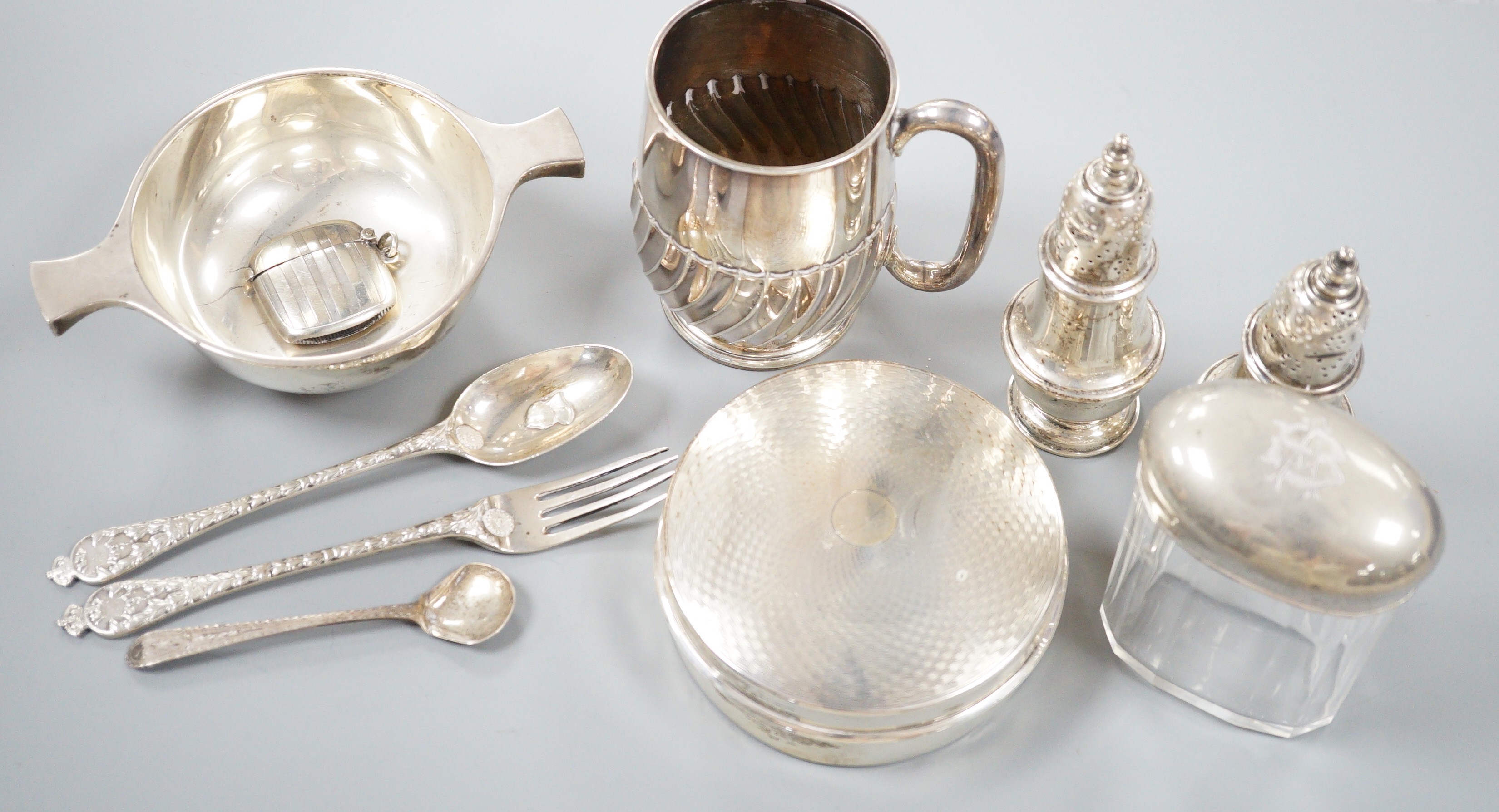 Small silver including a George V quaich, Edinburgh, 1928, a pair of condiments, circular box and cover, mug, toilet jar and three items of cutlery.